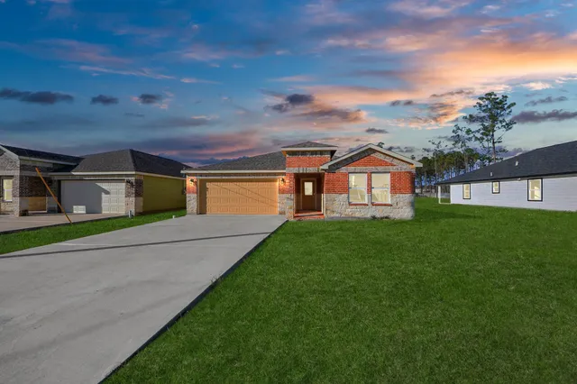 a front view of house with yard