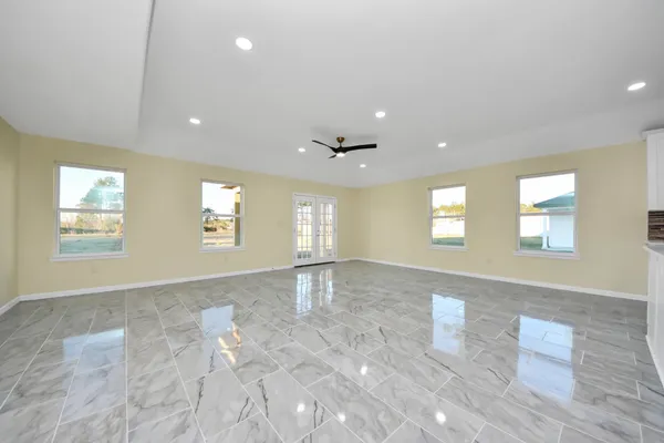 a view of an empty room and window