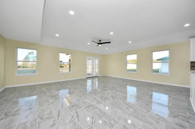 a view of a livingroom and window