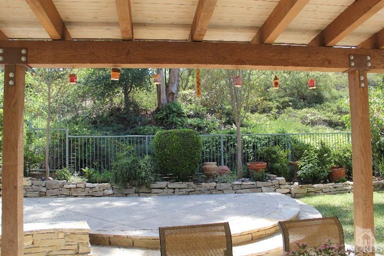 11212 Terraceridge Road Moorpark, CA 93021 - Photo 24 of 26 a view of a backyard with plants and a fountain