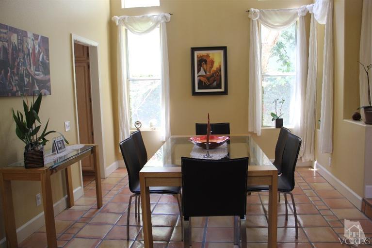 11212 Terraceridge Road Moorpark, CA 93021 - Photo 7 of 26 a view of a dining room with furniture and a window