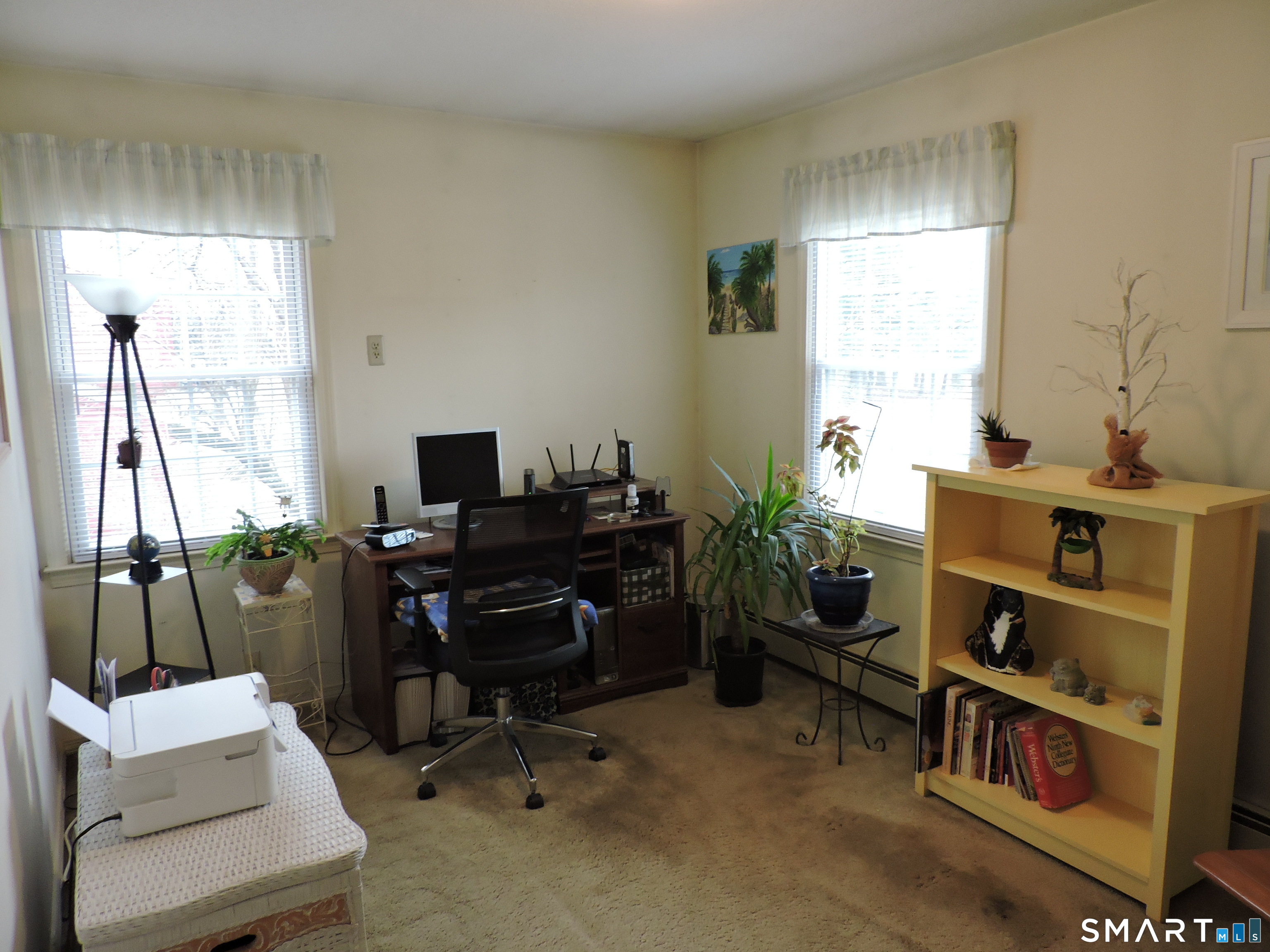 814 Graham Road South Windsor, CT 06074 - Photo 14 of 23 a view of a workspace with furniture and a window