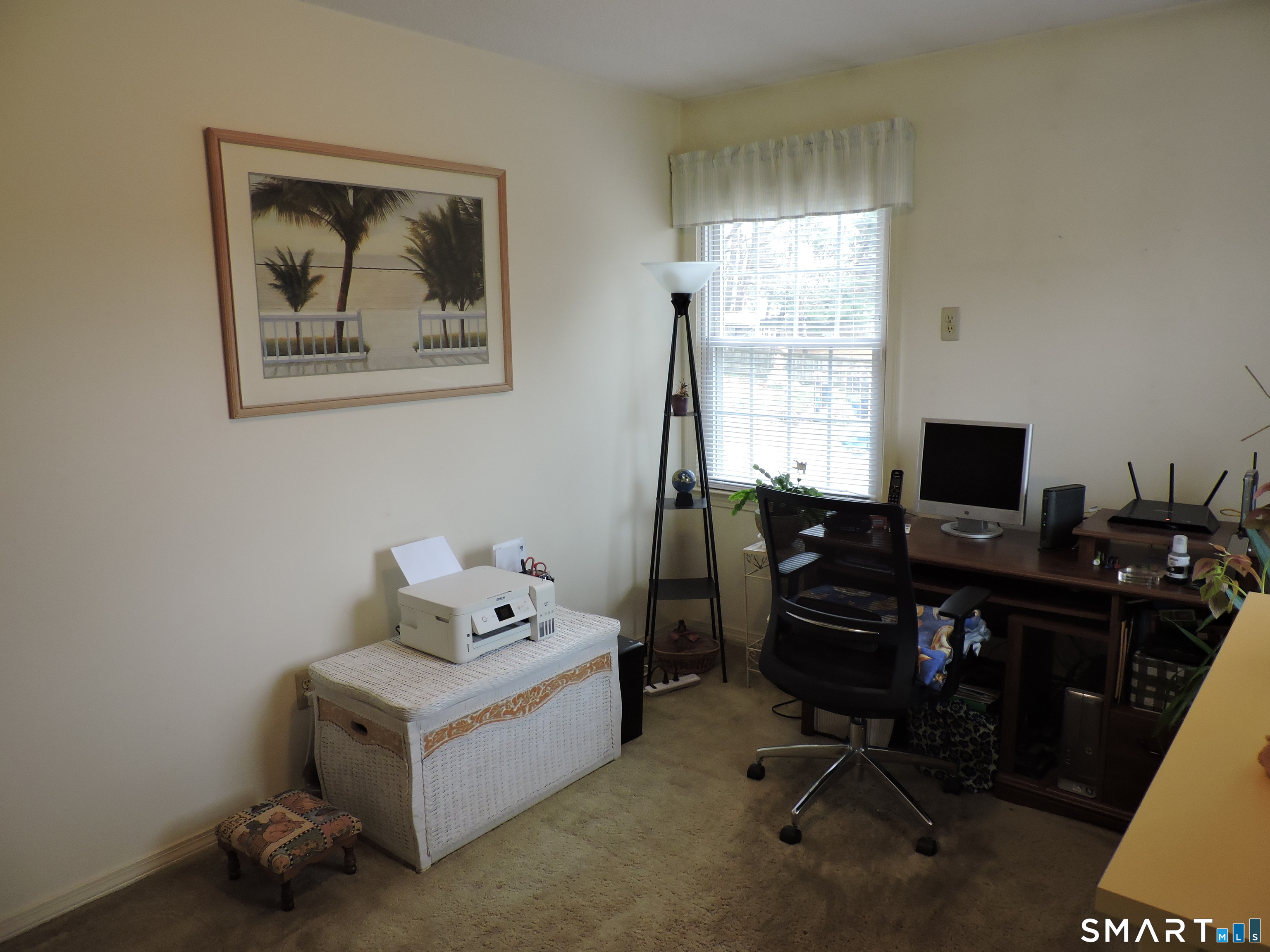 814 Graham Road South Windsor, CT 06074 - Photo 15 of 23 a view of a workspace with furniture and a window