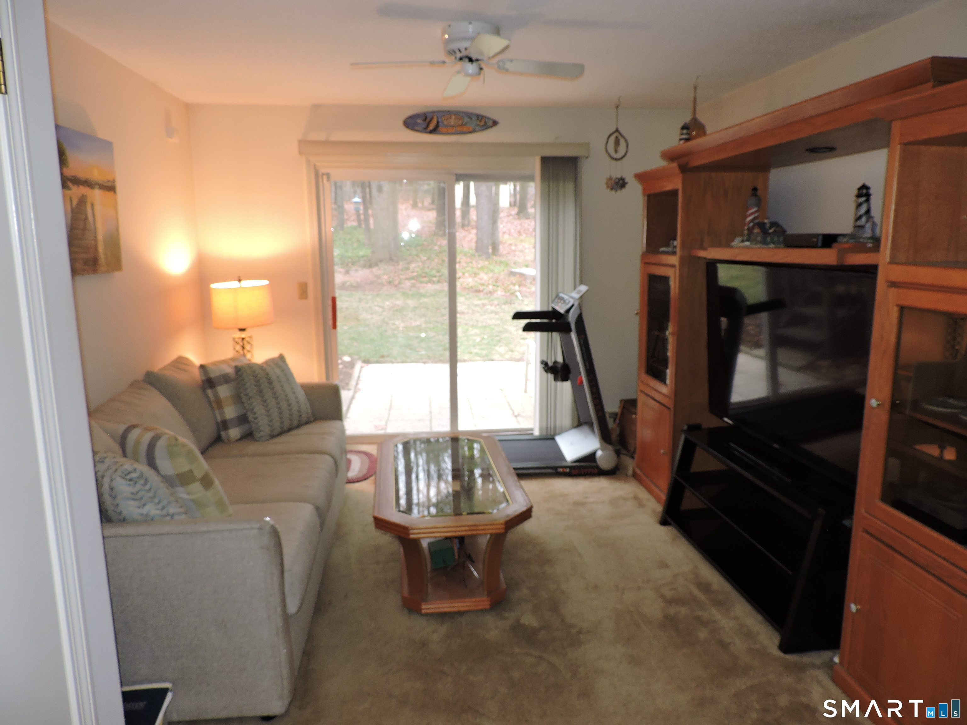 814 Graham Road South Windsor, CT 06074 - Photo 17 of 23 a living room with furniture and a fireplace