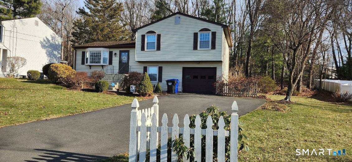 814 Graham Road South Windsor, CT 06074 - Photo 3 of 23 a front view of a house with a yard
