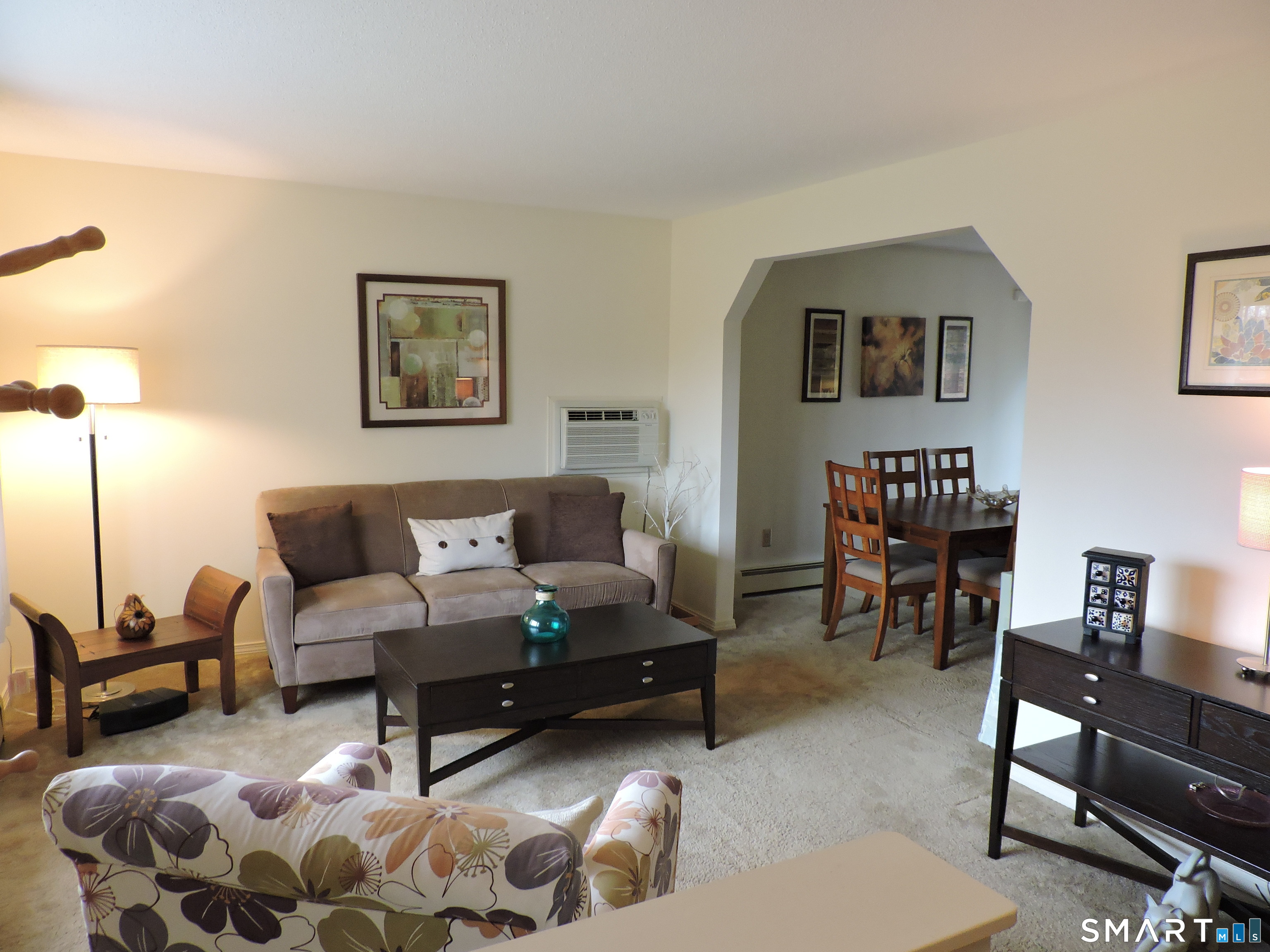 814 Graham Road South Windsor, CT 06074 - Photo 4 of 23 a living room with furniture and a rug