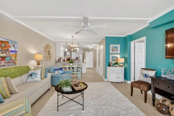 a living room with furniture and a table