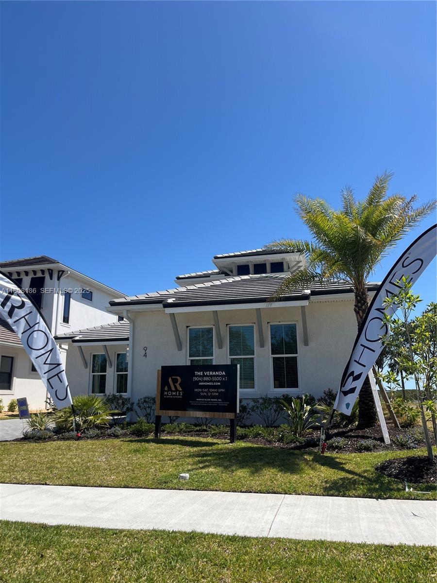 129 Coronado Road Flagler Beach, FL 32136 - Photo 11 of 15 a view of a house with a yard