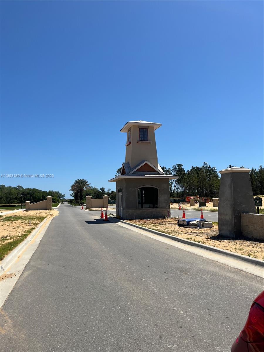 129 Coronado Road Flagler Beach, FL 32136 - Photo 4 of 15 a view of a terrace with a bench