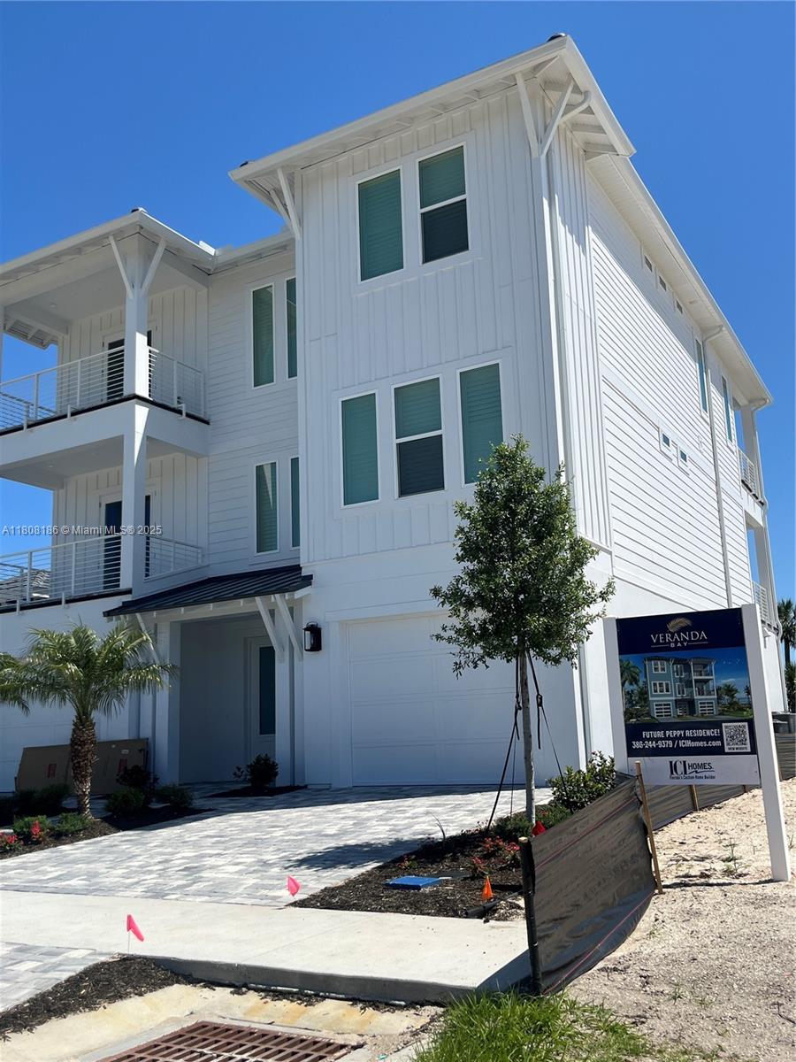 129 Coronado Road Flagler Beach, FL 32136 - Photo 9 of 15 a house view with a backyard space