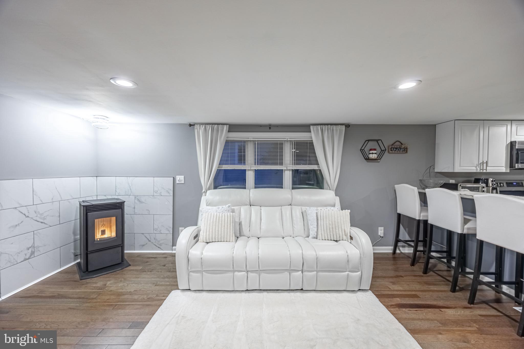 1920 Poplar Road Essex, MD 21221 - Photo 14 of 77 Cozy pellet stove in living room