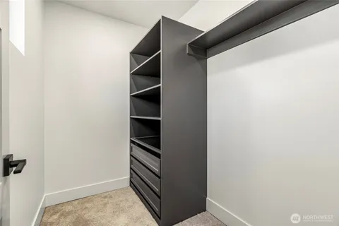 a view of cabinets with wooden floor