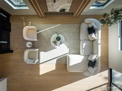a bathroom with a sink mirror and vanity