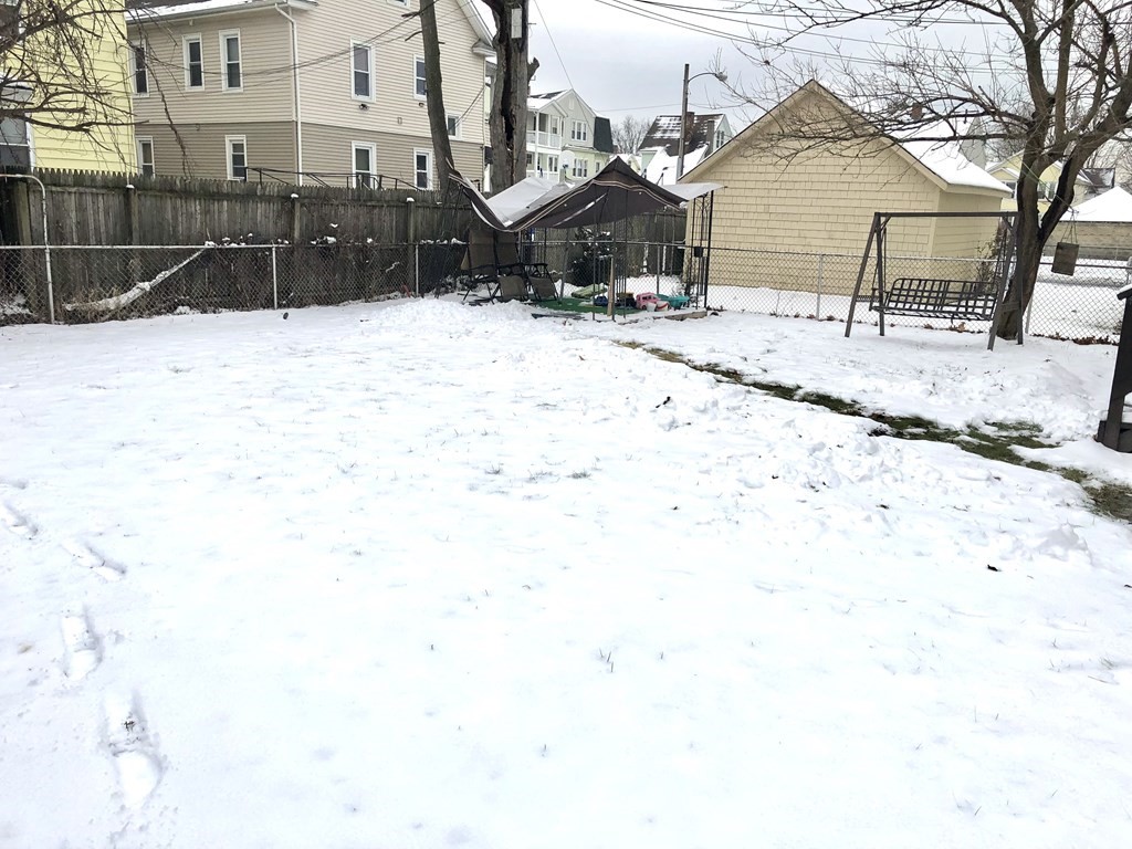71 Phoenix Terrace Springfield, MA 01104 - Photo 5 of 22 a street view covered with snow