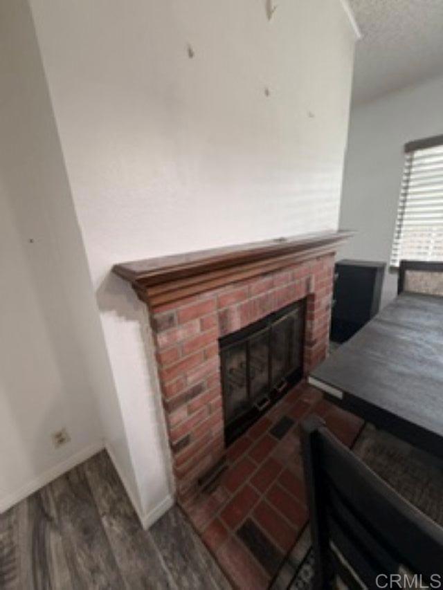 12506 Royal Road, Unit 5 El Cajon, CA 92021 - Photo 6 of 17 Fireplace in dining area