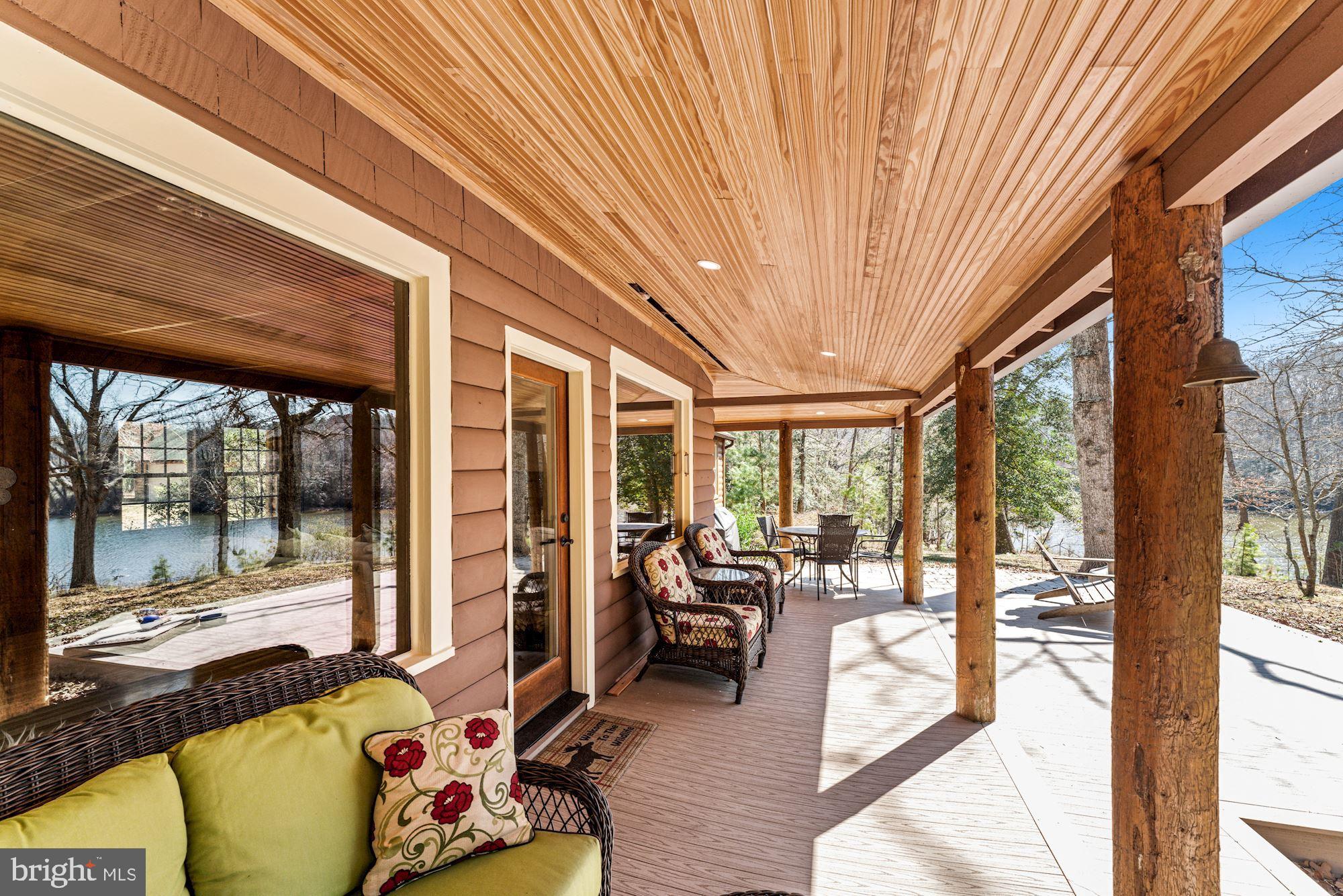 17159 Woodscroft Road Ridge, MD 20680 - Photo 26 of 50 Rear Covered Porch