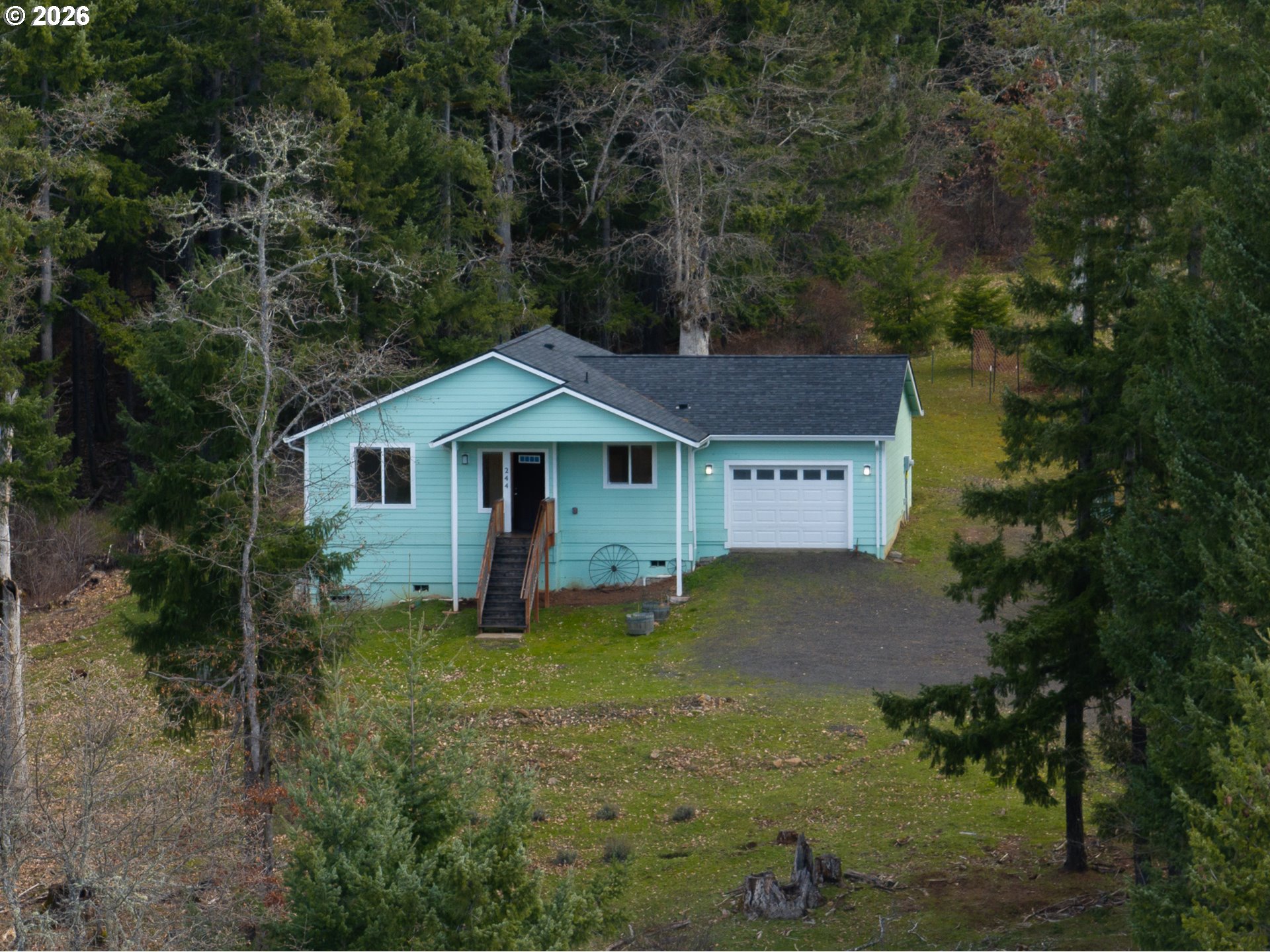 244 Lyons Road White Salmon, WA 98672 - Photo 22 of 22 a view of a house with a yard