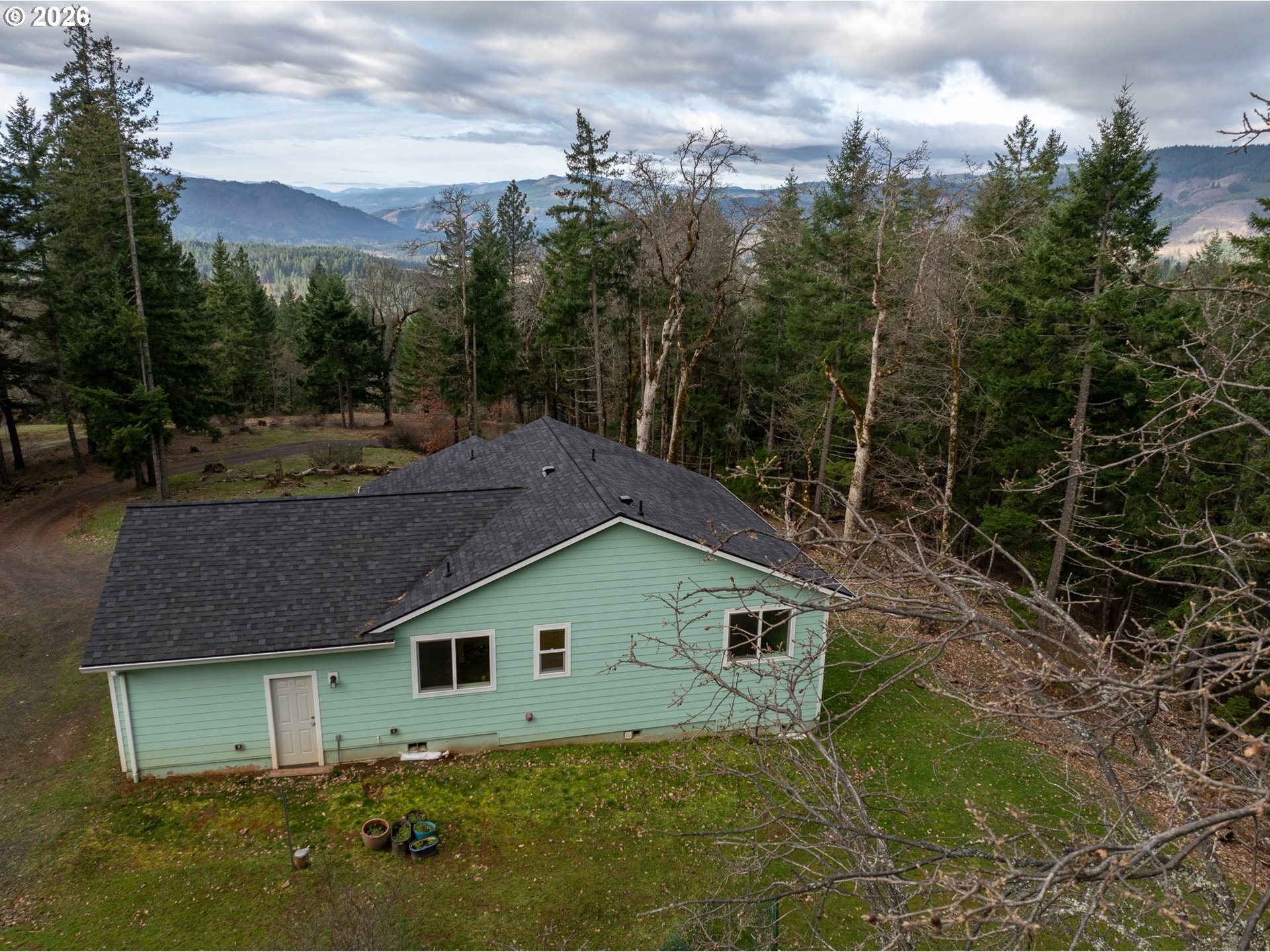 244 Lyons Road White Salmon, WA 98672 - Photo 4 of 22 a house view with a garden space
