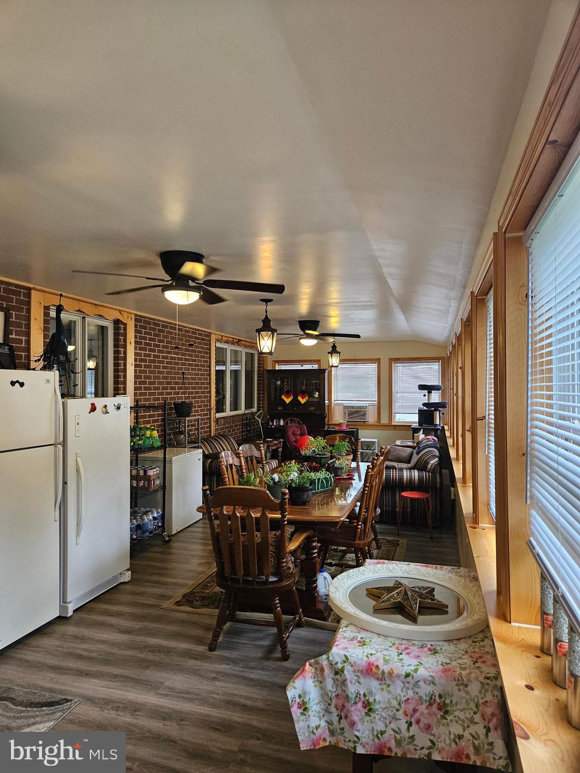 1115 Bishop Walsh Road Cumberland, MD 21502 - Photo 12 of 44 a view of a kitchen with dining table and chairs