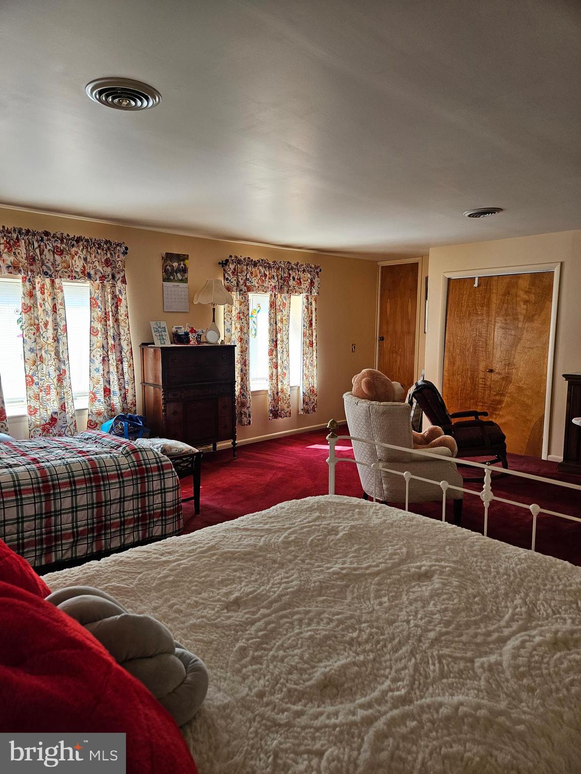 1115 Bishop Walsh Road Cumberland, MD 21502 - Photo 23 of 44 a bedroom with furniture and a flat screen tv