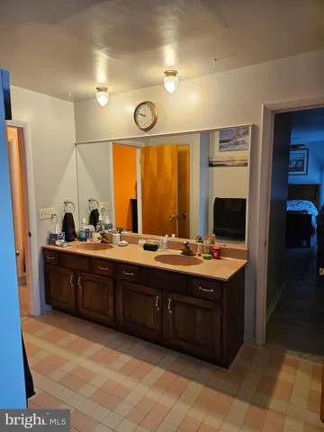a kitchen with a refrigerator and a stove