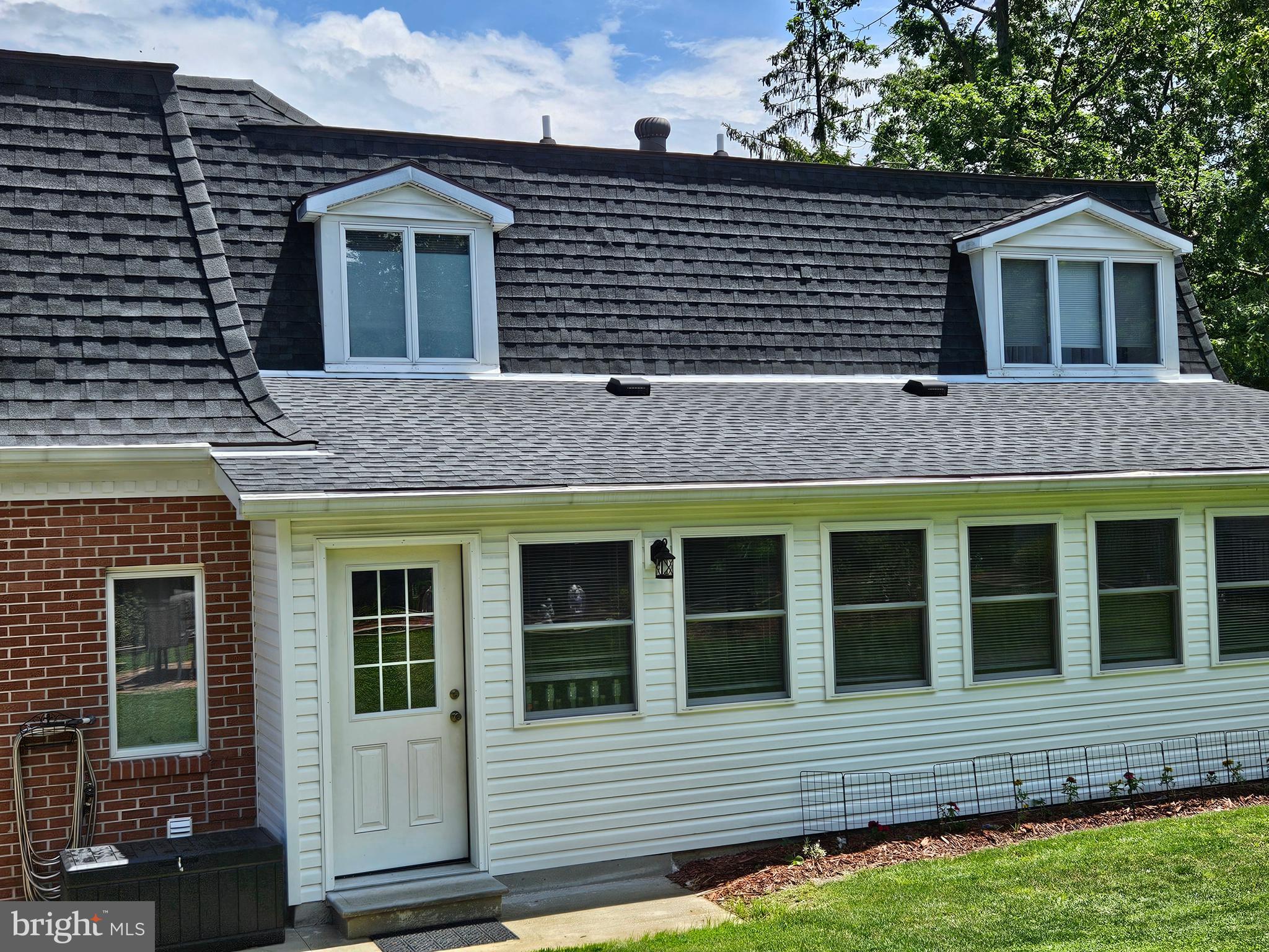 1115 Bishop Walsh Road Cumberland, MD 21502 - Photo 37 of 44 a front view of a house with a yard
