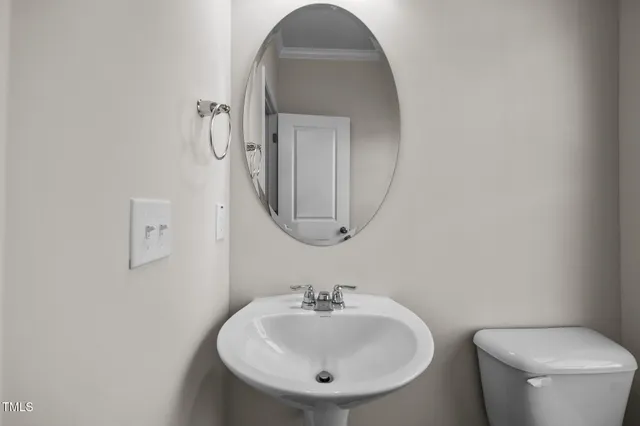 a view of kitchen with wooden floor and electronic appliances