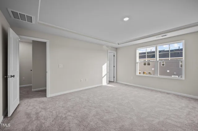 a bathroom with a double vanity sink mirror and shower