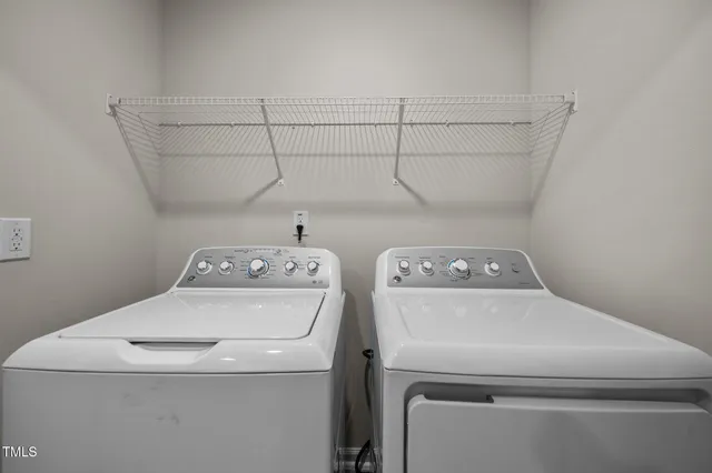 a bathroom with a sink mirror and toilet
