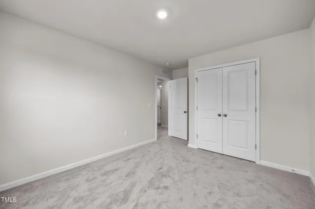 a view of empty room with windows