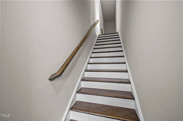 a view of an empty room and window wooden floor and windows in a room