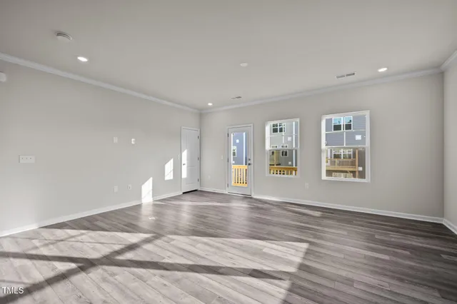 a stove top oven sitting inside of a kitchen
