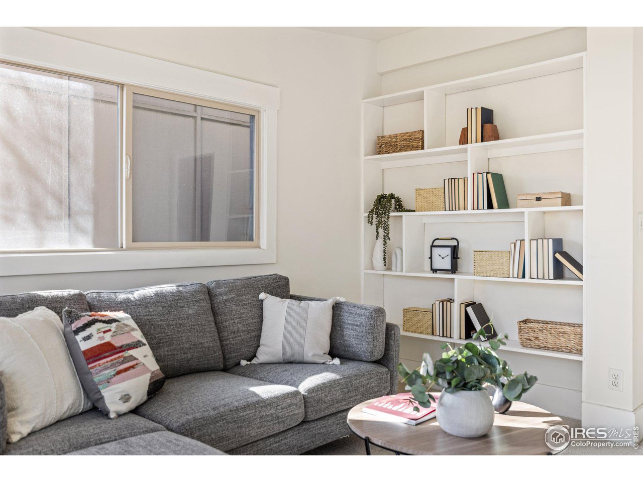 4464 Raleigh Street Denver, CO 80212 - Photo 16 of 39 a living room with furniture and a potted plant