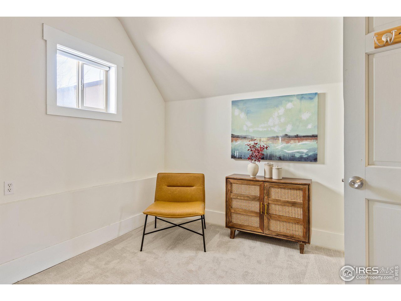 4464 Raleigh Street Denver, CO 80212 - Photo 24 of 39 a living room with furniture and a window