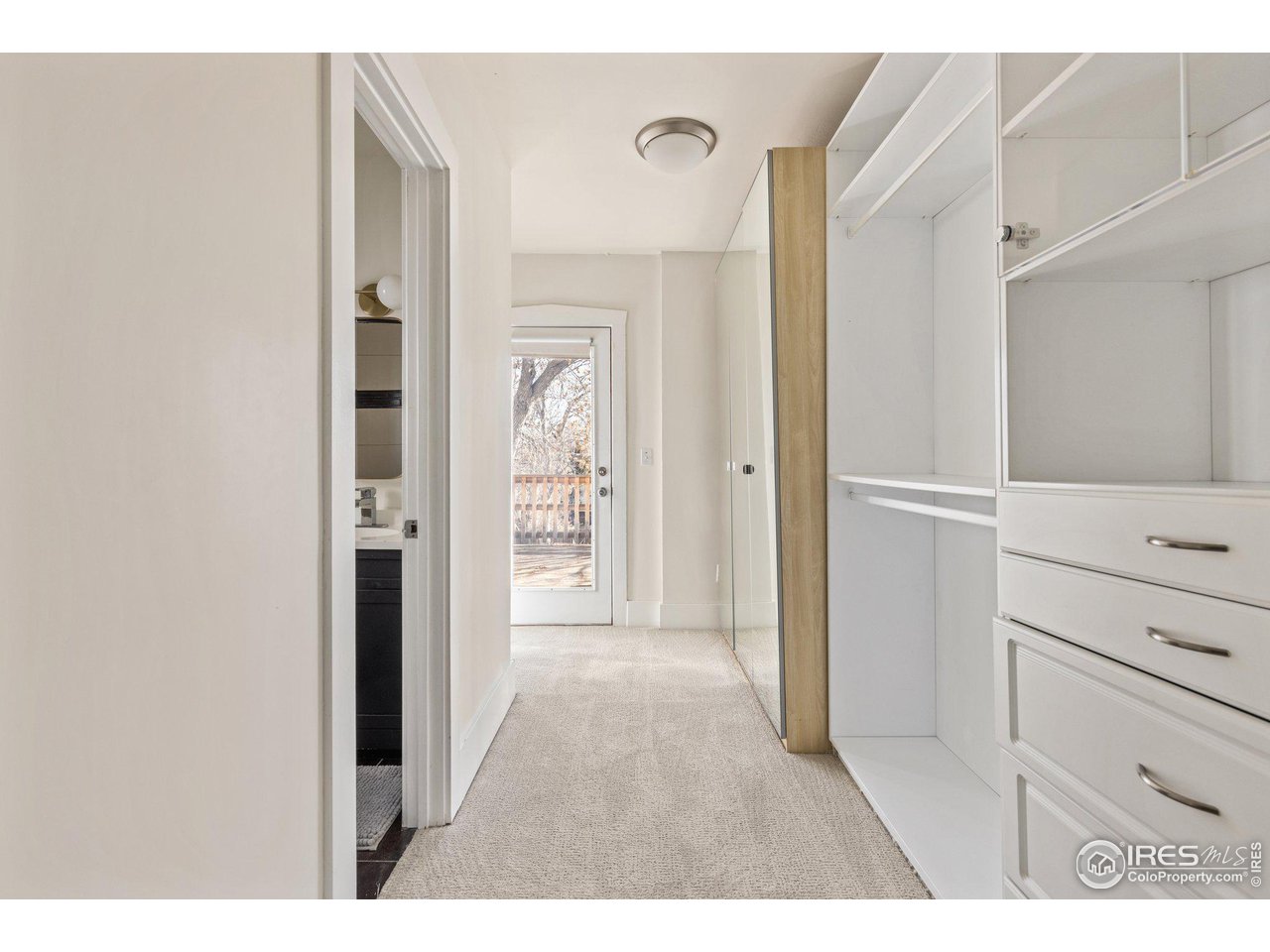 4464 Raleigh Street Denver, CO 80212 - Photo 25 of 39 a view of a bedroom from the hallway