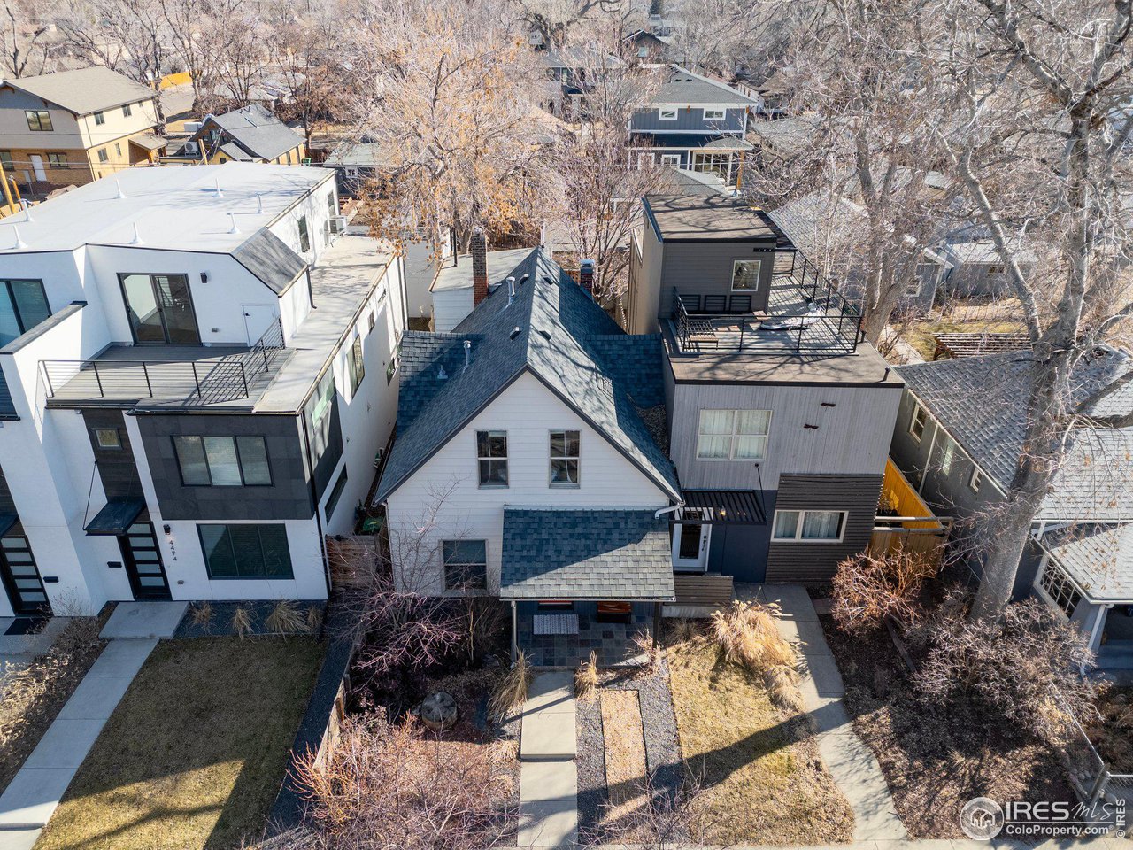4464 Raleigh Street Denver, CO 80212 - Photo 3 of 39 a view of a house with a chairs in patio