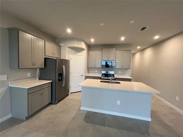 a view of a hallway with a couch