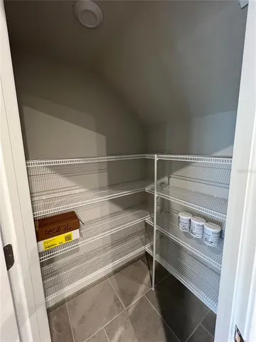 a view of kitchen and a window