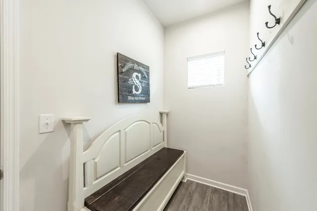 a view of a hallway view with staircase