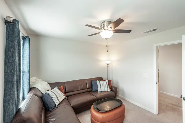 a view of backyard with furniture and garden