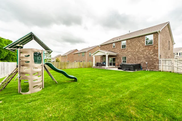 a view of a backyard with a garden