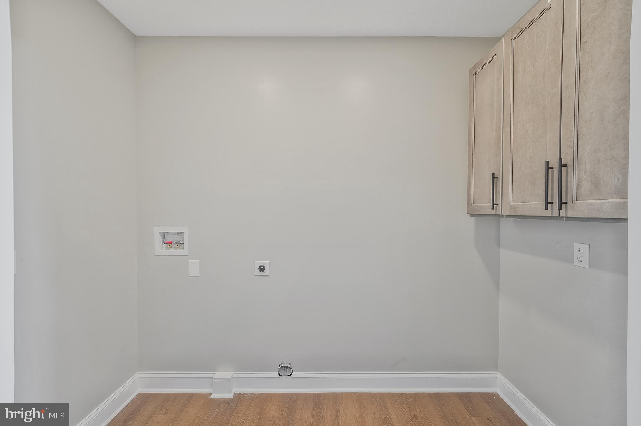 9208 4th Street Lanham, MD 20706 - Photo 27 of 43 UPPER LEVEL LAUNDRY ROOM