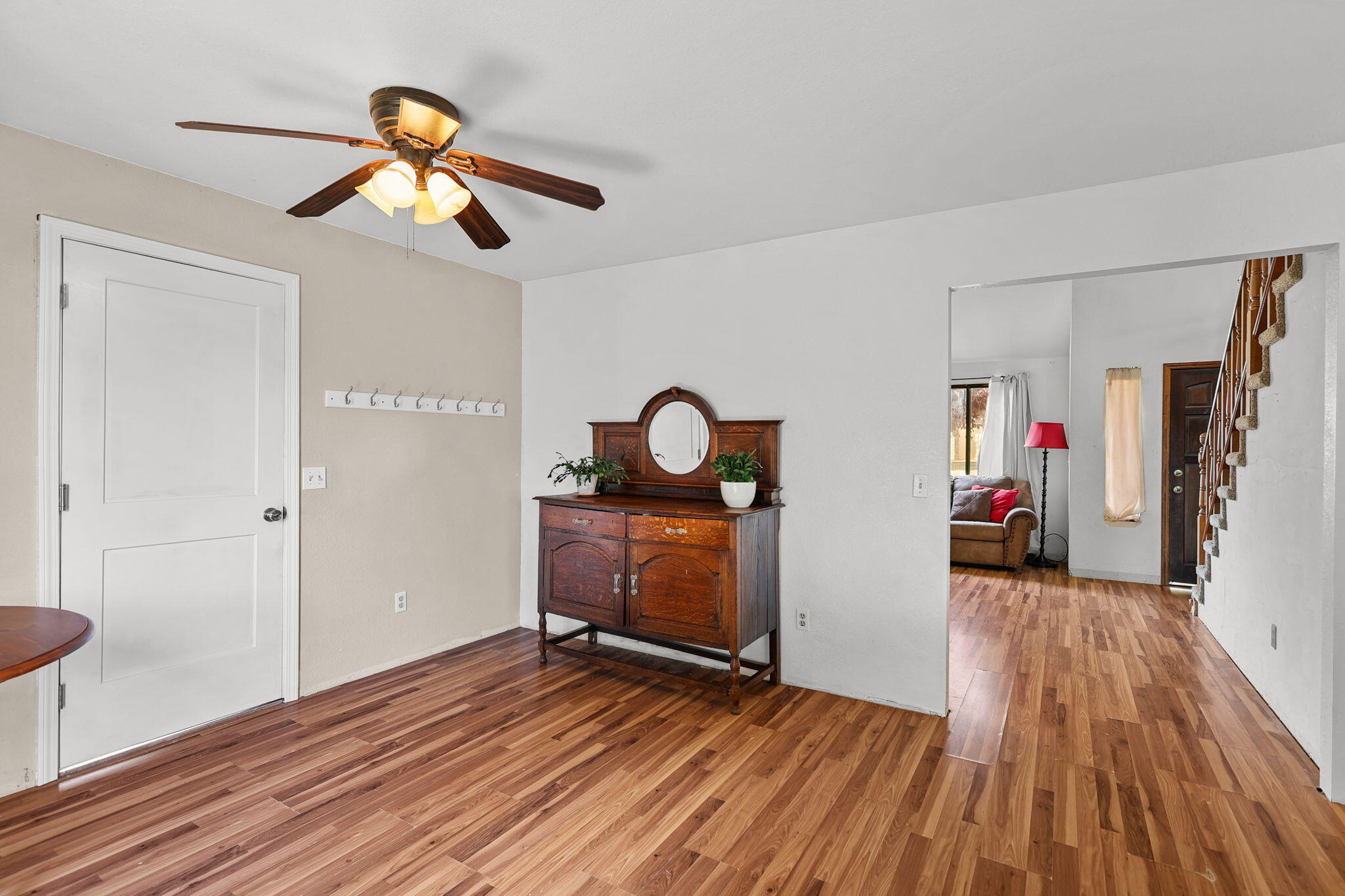 404 Woodhill Drive Redding, CA 96003 - Photo 12 of 52 a view of a room with wooden floor air conditioner and windows