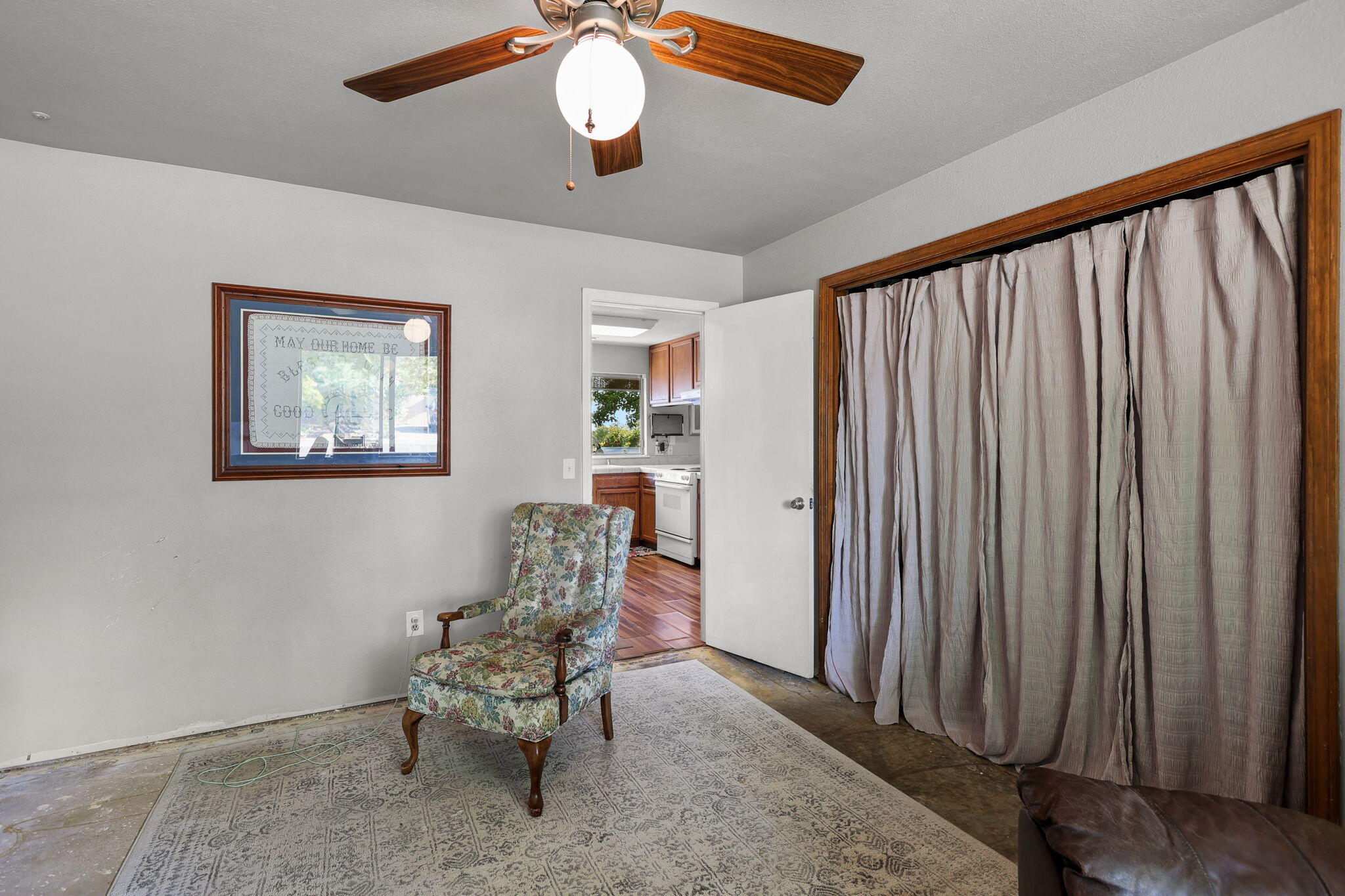 404 Woodhill Drive Redding, CA 96003 - Photo 17 of 52 a living room with furniture and a large window