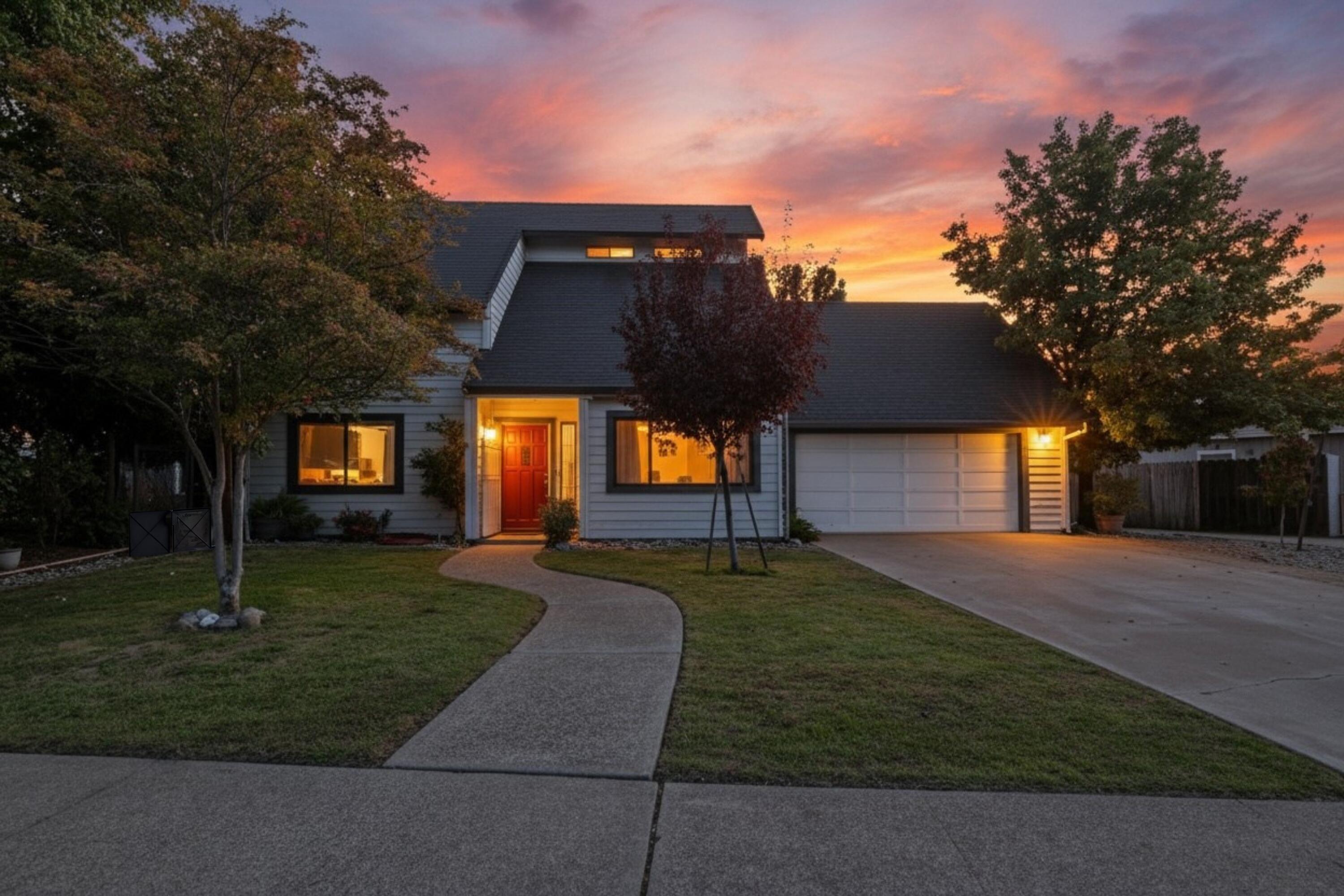 404 Woodhill Drive Redding, CA 96003 - Photo 2 of 52 a front view of a house with a yard