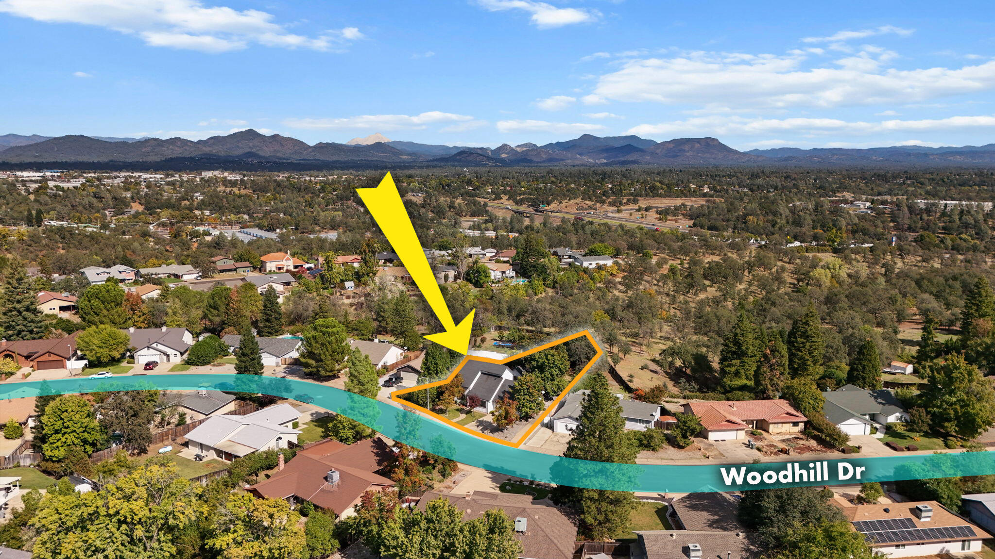 404 Woodhill Drive Redding, CA 96003 - Photo 3 of 52 a view of a lake with a mountain