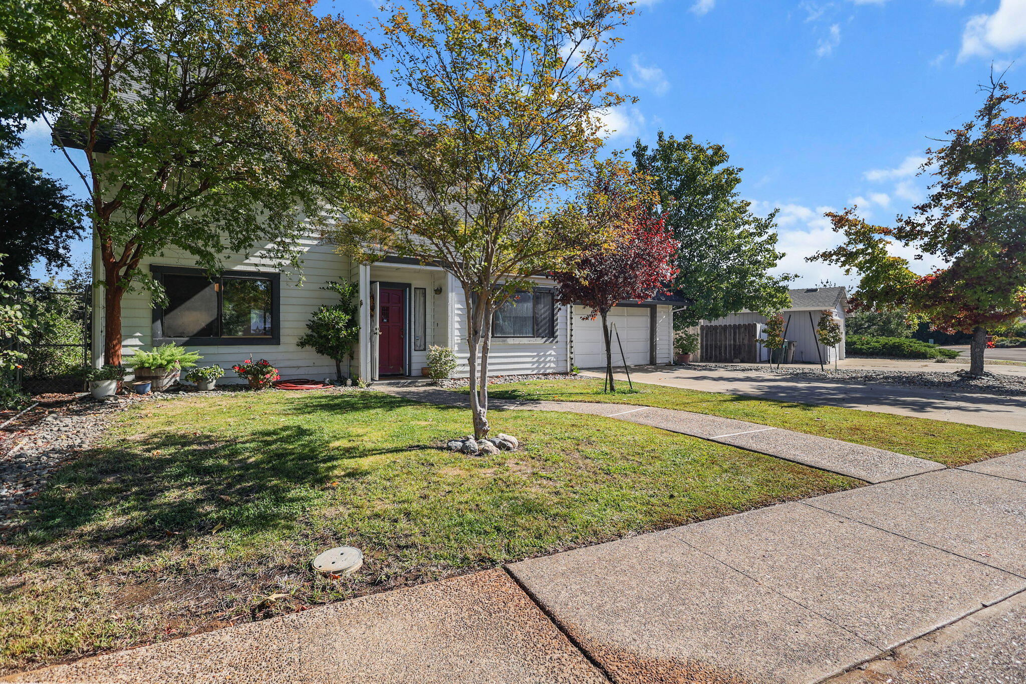 404 Woodhill Drive Redding, CA 96003 - Photo 37 of 52 a swimming pool with outdoor seating and yard