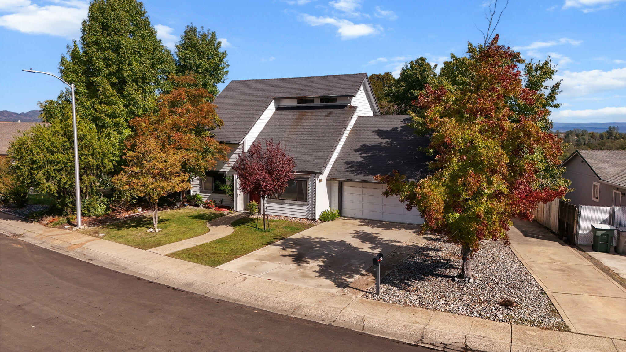 404 Woodhill Drive Redding, CA 96003 - Photo 40 of 52 a view of a house with basketball court
