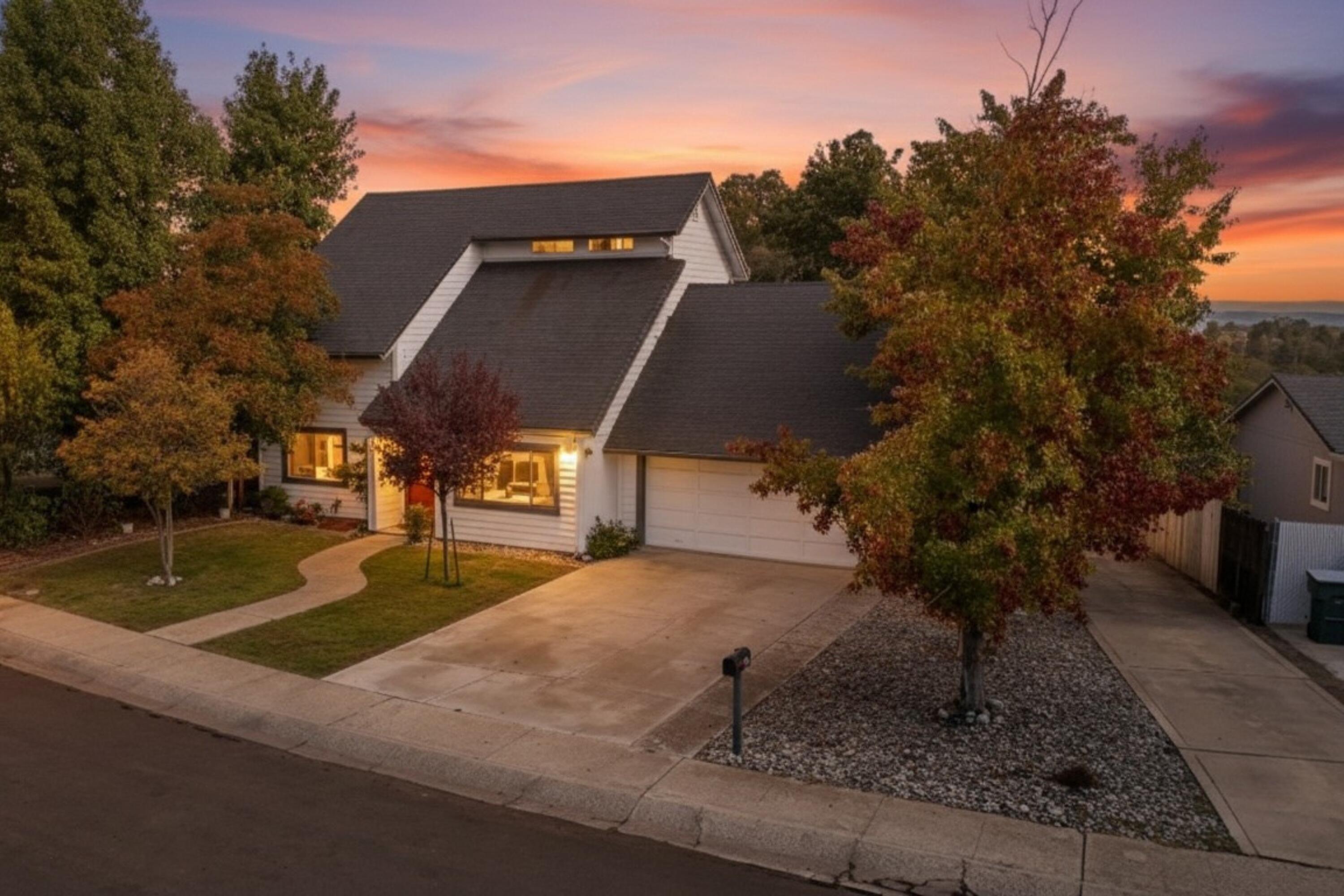 404 Woodhill Drive Redding, CA 96003 - Photo 7 of 52 a view of a house with a yard