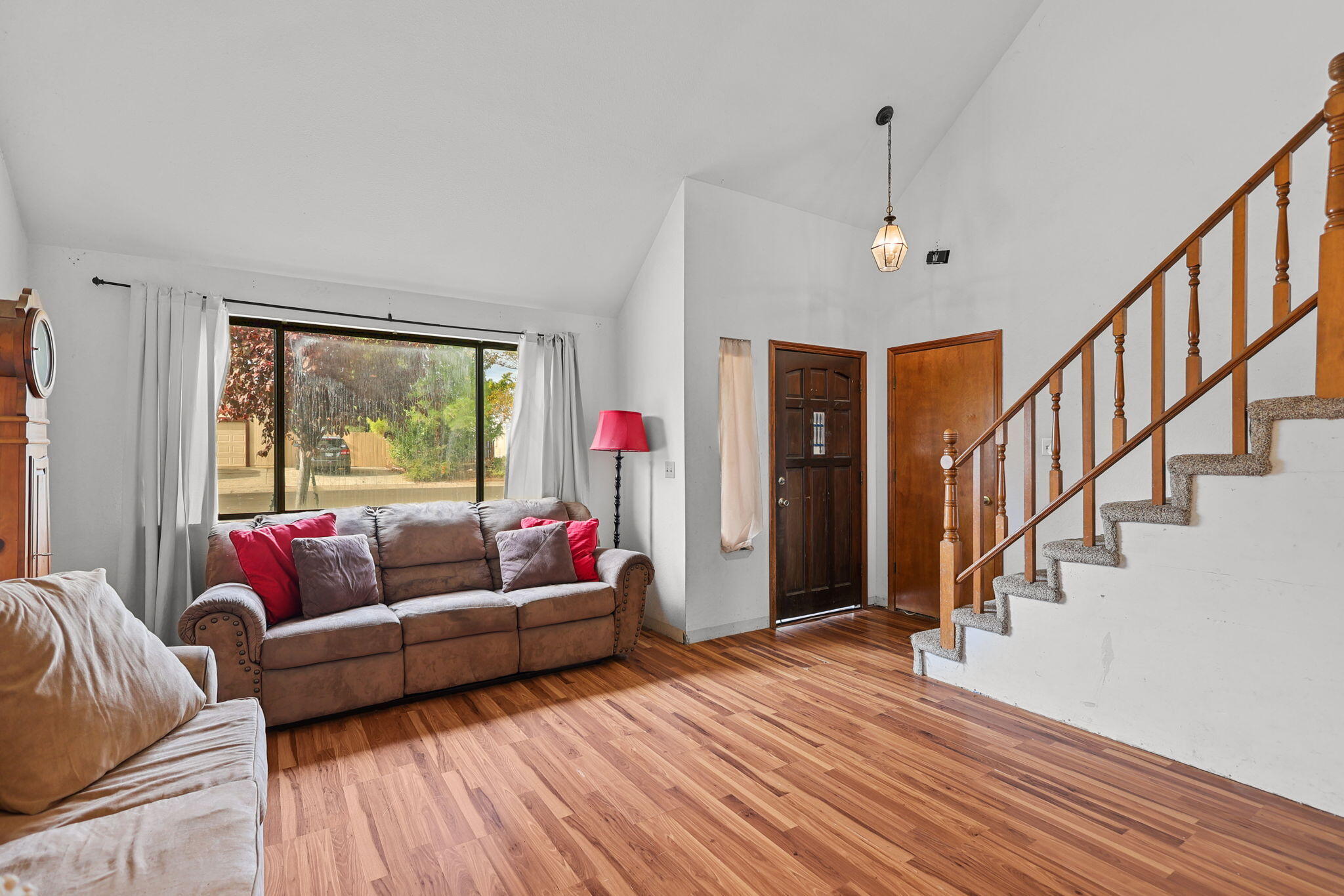 404 Woodhill Drive Redding, CA 96003 - Photo 10 of 52 a living room with furniture and a large window